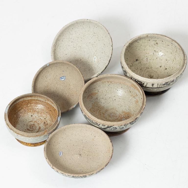 Six ceramic jars with covers, South East Asian, 17th and 19th century.