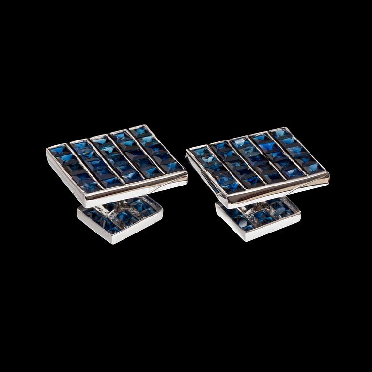 A set of matching sapphires cufflinks and tailcoat buttons.