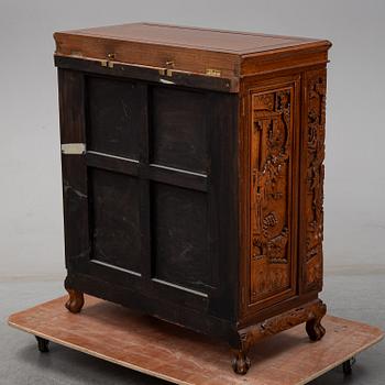 A 20th century chinese bar cabinet.