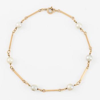 Armband, 18K guld med pärlor.