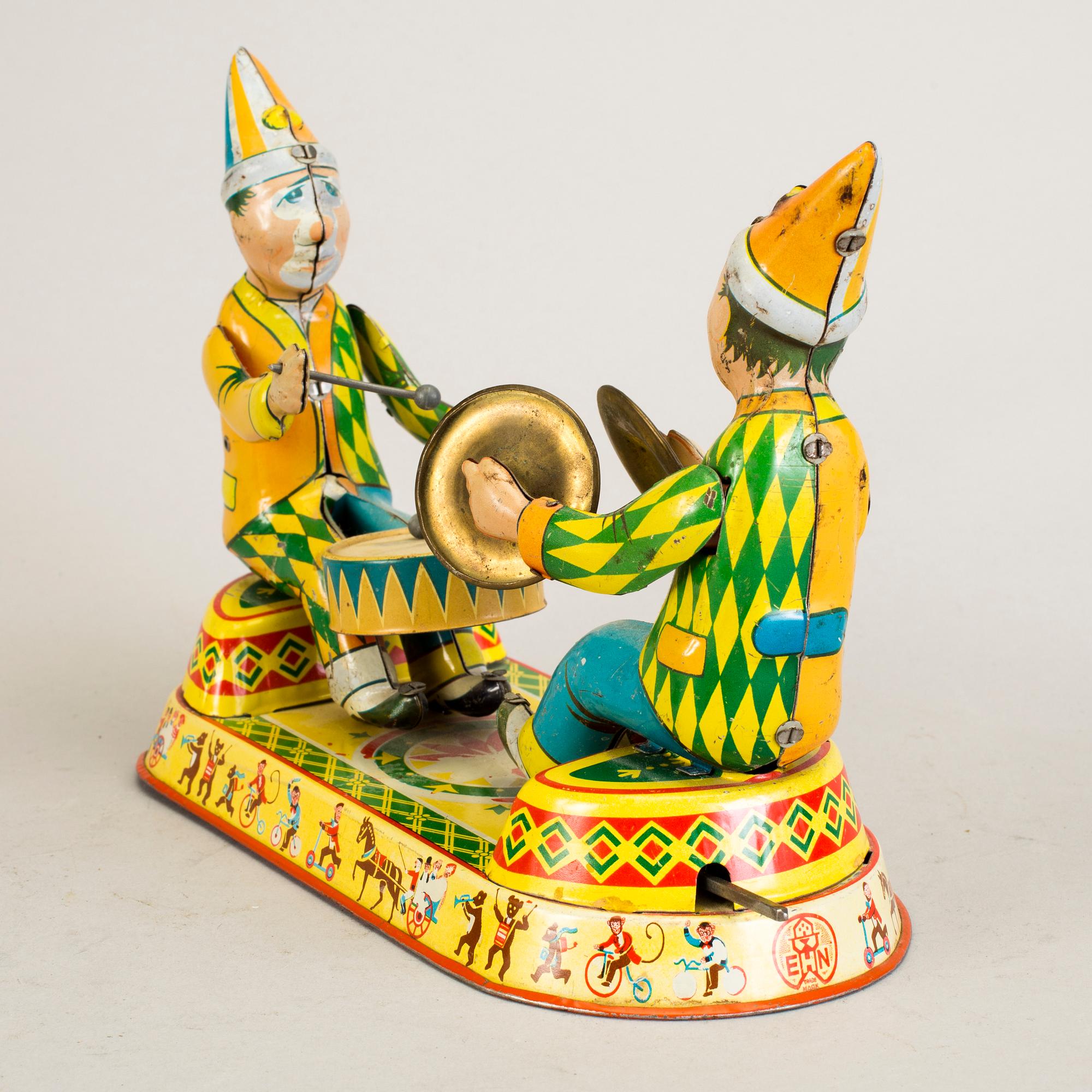 A lot of three tinplate toys Japan and Germany 1950s.