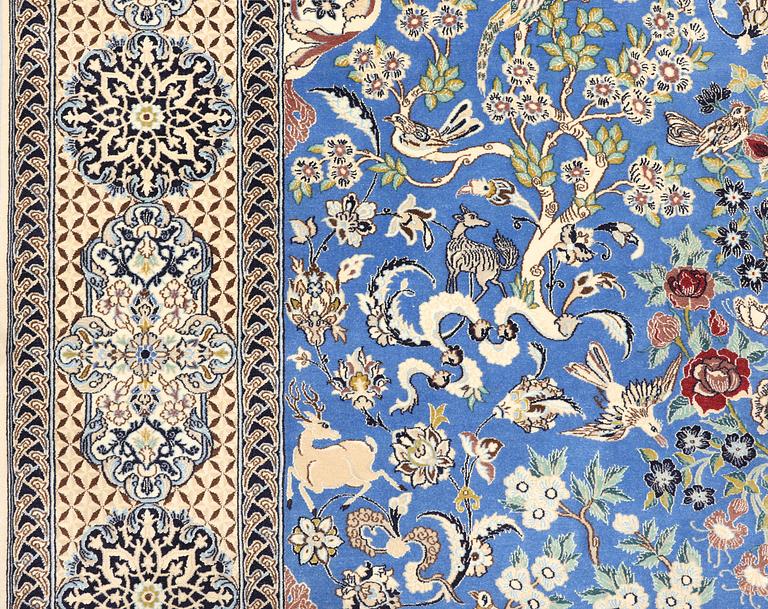 A Figural Nain-Isfahan carpet, part silk, 318 x 213 cm.