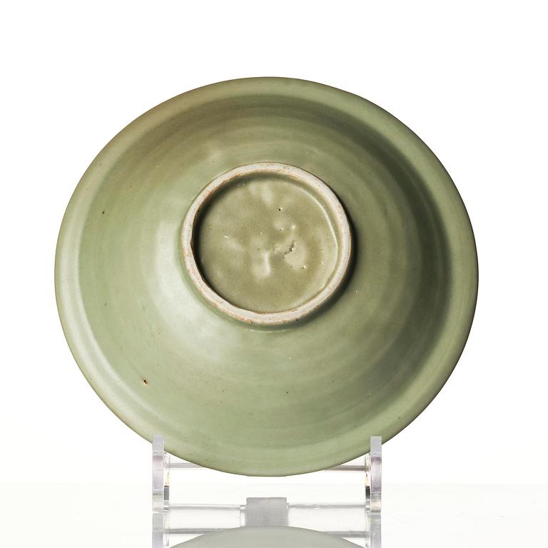 A celadon glazed double fish dish, Ming dynasty (1368-1644).