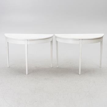 A pair of moon tables, 19th century.