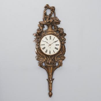 A 18th century wall clock.