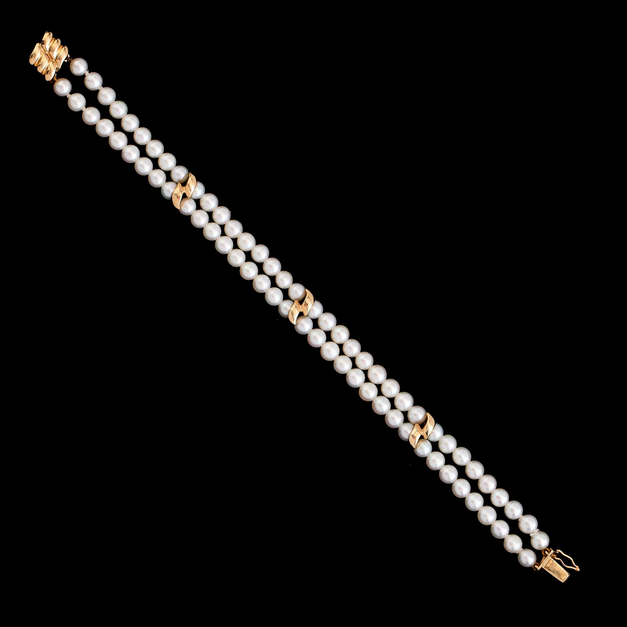 ARMBAND, 14 k guld, odlade pärlor.