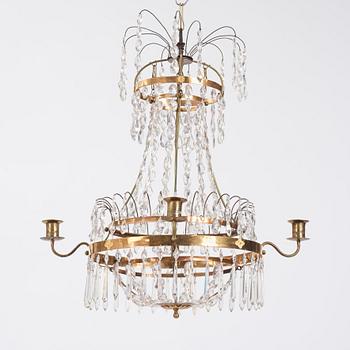 A late Gustavian four-light chandelier, early 19th century.