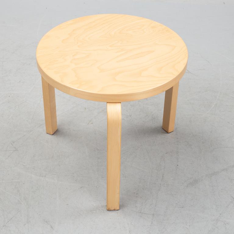 A bench and a stool by Alvar Aalto, from around the year 2000.