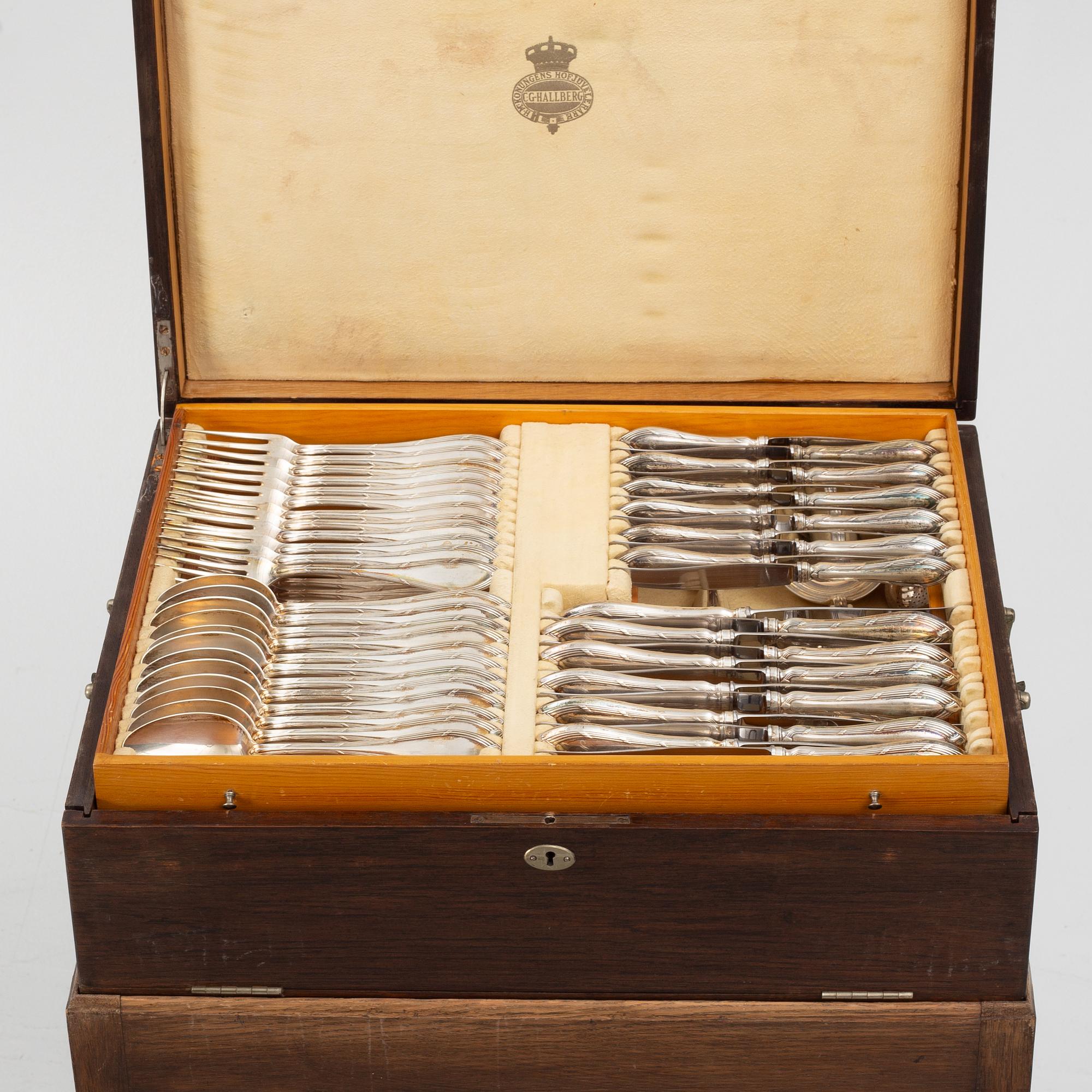 A Swedish silver cutlery set in case, mark of CG Hallberg, Stockholm 1913-17 (91 pieces).