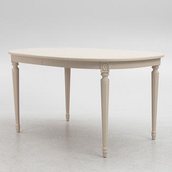 A Gustavian Style Dining Table and 10 Chairs, second half of the 20th Century.