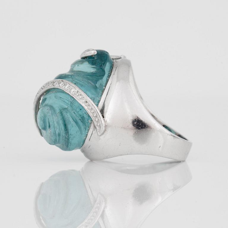 A carved aquamarine and diamond ring designed by Siegfried Egger, Stockholm.