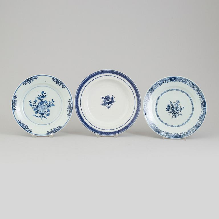 Two blue and white export porcelain plates and a soup plate, Qing dynasty, Qianlong (1736-95).