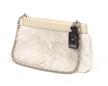 300. An rabbit fur evening bag by Chanel.