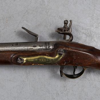 A British military late 18th century flintlock musket.