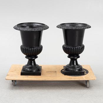 Garden urns, a pair, cast iron, 20th century.
