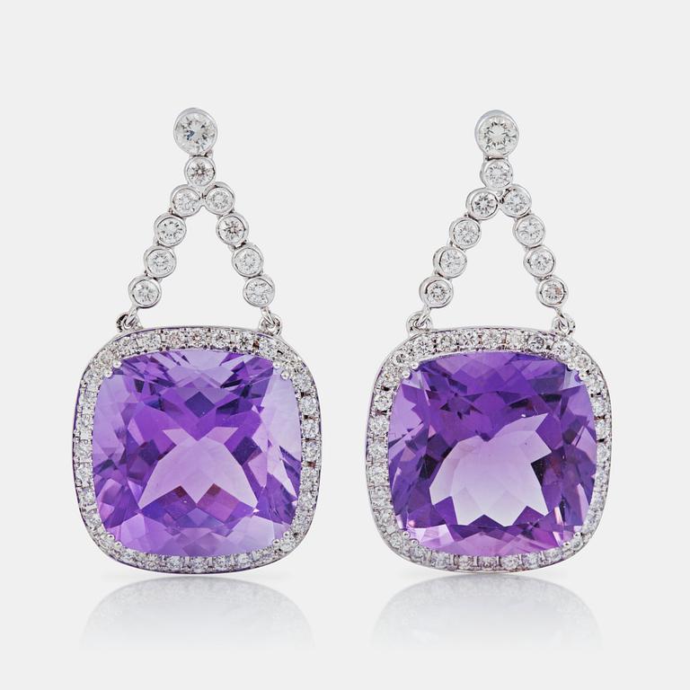 A pair of amethyst, ca 33.00 ct, and diamond, ca 1.62 ct, earrings.