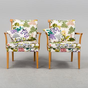 A pair of Norell easy chairs, 20th century.