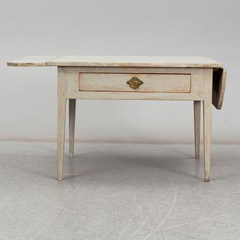 An early 19t Century folding table.