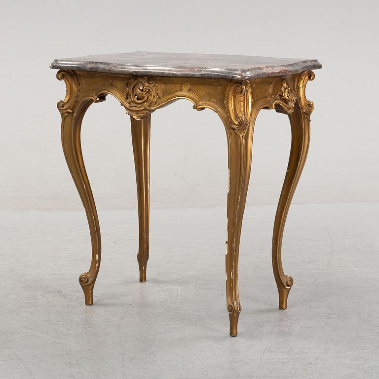 A rococo style table, around 1900.