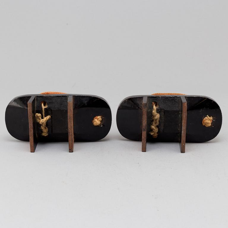 A pair of Japanese 'Geta' shows and two Chinese pouches, early 20th century.