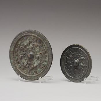 Two bronze mirrors, mid-late eastern Han dynasty, 2nd-3rd Century AD.