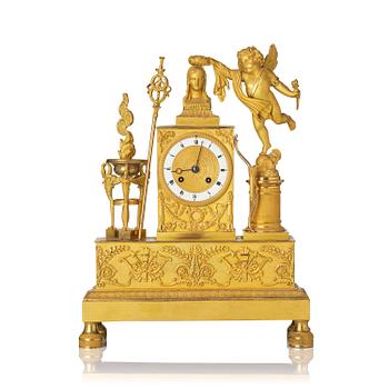 146. A French Empire ormolu figural mantel clock, early 19th century.