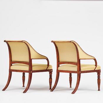 A pair of late gustavian armchairs in the manner of Ephraim Ståhl, Stockholm, circa 1800.