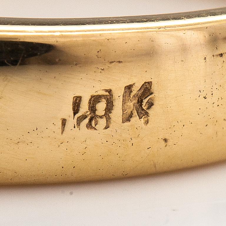 An 18K gold ring with tourmalines. Finland 2002.
