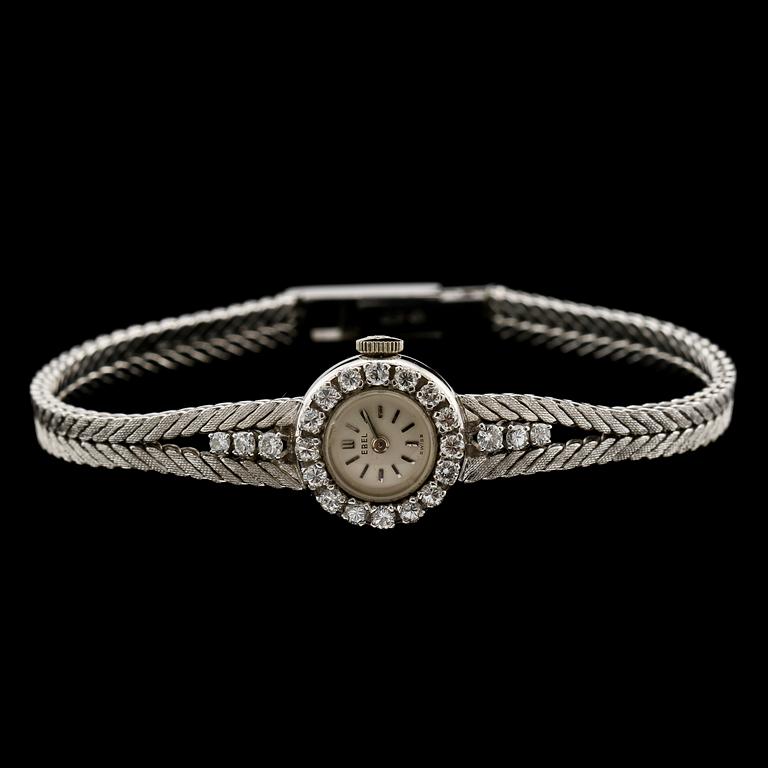 DAMARMBANDSUR, 18k vitguld med 22 briljantslipade diamanter, tot ca 0.66 ct, Ebel, Schweiz, 1900-tal. Vikt 24 g.
