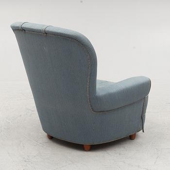 Carl Malmsten, a 'Jättepaddan' armchair, mid 20th Century.