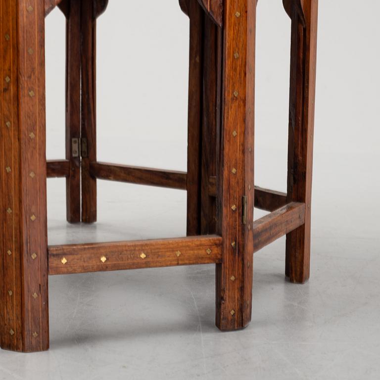 An Anglo Indian folding octagonal side table.