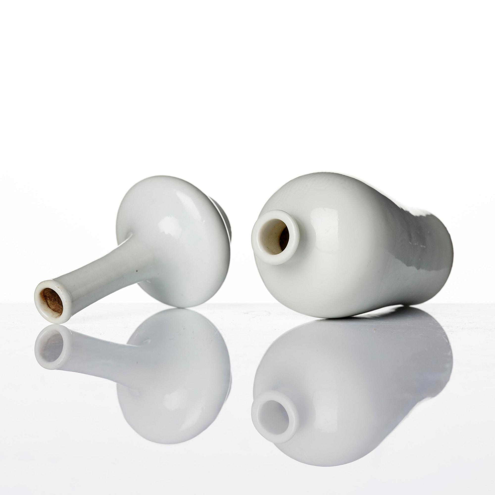 A pair of white glazed vases, Qing dynasty, 18th century.