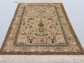 A Oriental silk carpet, 152 x 94 cm.