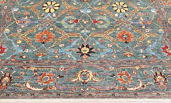 A carpet, Ziegler Design, c. 314 x 243 cm.