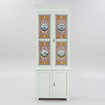 A painted cabinet, circa 1900.