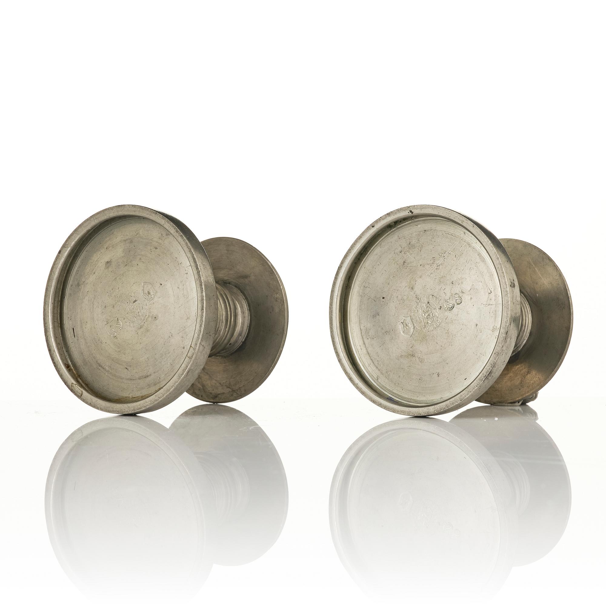 Nils Fougstedt, a pair of candlesticks model 1189, Firma Svenskt Tenn, Stockholm, 1929.