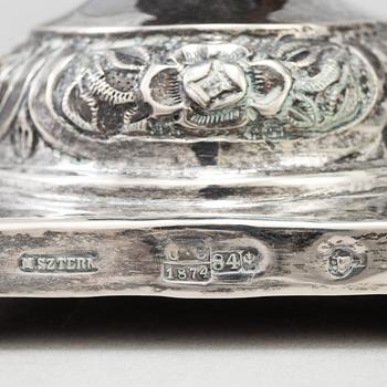 A pair of silver Sabbath candlesticks, Maker M. Sztern, Warsaw, Poland. Assayer Josef Sosnkowski, 1864. Weight 833 g.