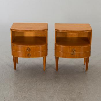 A pair of bedside tables from the mid 20th century.