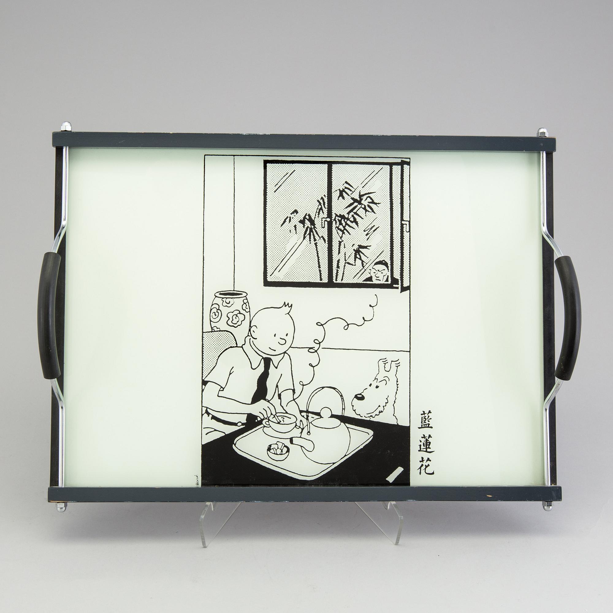 A set of 6 dinnerplates and two small plates and a serving tray depicting Tintin, Axis, France.