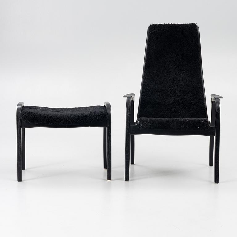 Yngve Ekström, a 'Lamino' easy chair with foot stool, Swedese 2010.