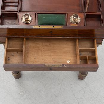 A French Empire mahogany sewing table, first part 19th century.