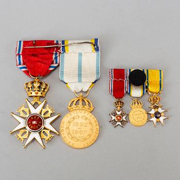 Order of S.t Olav, Norway, Knights Cross, gilt and enamel, together with av Swedish silver medal.