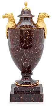 638. A Swedish late Gustavian 19th Century porphyry and gilt bronze urn.