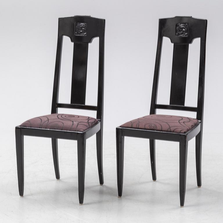 Ten carved oak chairs, Myrstedt & Stern A.-B., Stockholm, early 20th Century.