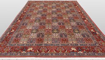 A Moud part silk carpet, 354 x 252 cm.