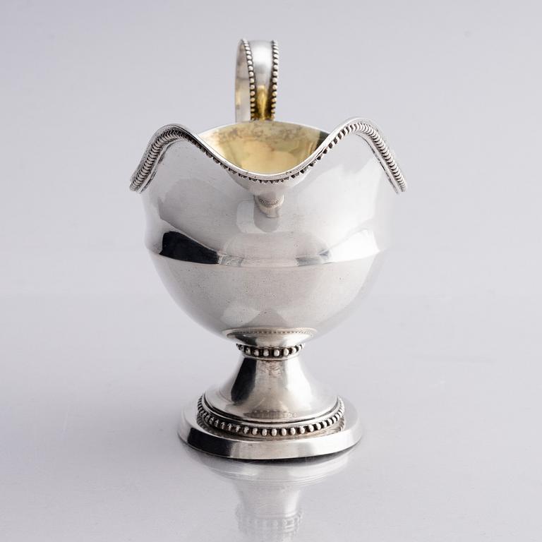 A Swedish 18th century parcel-gilt silver cream-jug, mark of Daniel Lundström, Stockholm 1787.