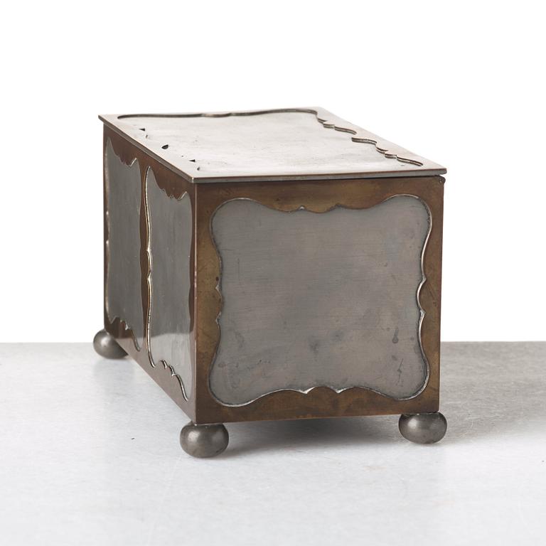 Firma Svenskt Tenn, a pewter and brass box, Stockholm 1930, model A 854.