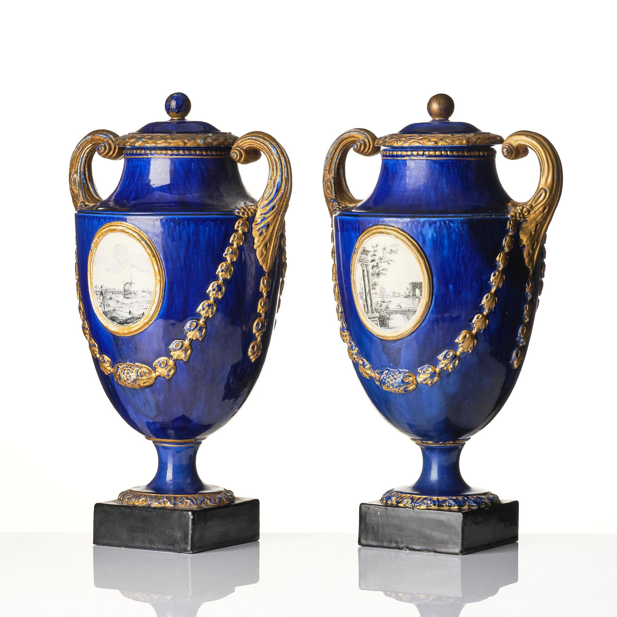A pair of Swedish cream ware 'pistol handle' jars with covers, 1790's.