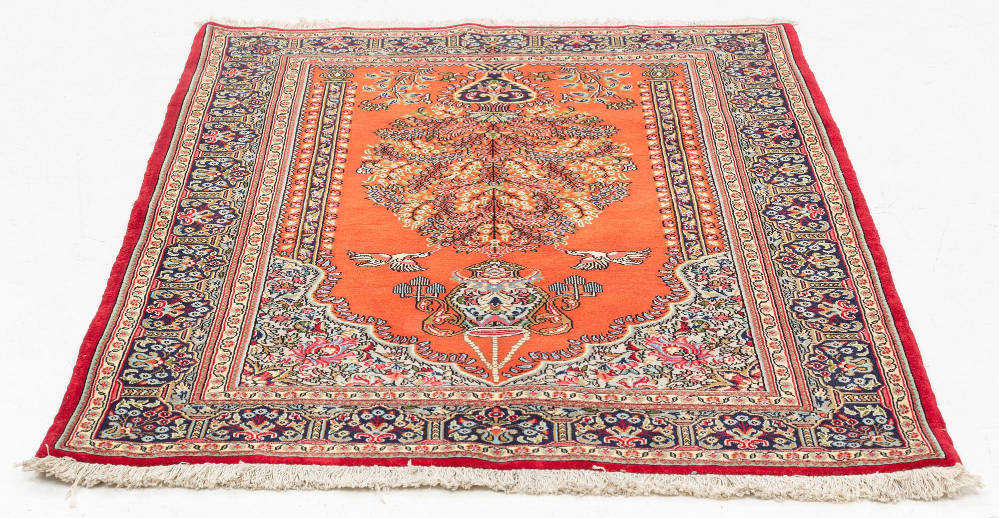 A Quum rug, ca 152 x 106 cm.
