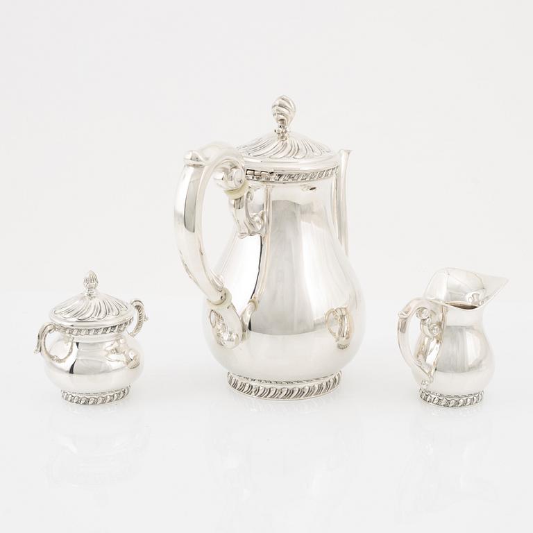 A three-piece rococo style silver coffee service, Swedish import marks by MEMA.